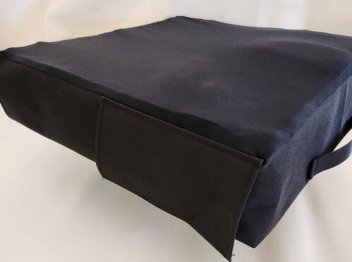 Aquila customizable wheelchair cushion Black wheelchair seat cushion with contoured shape.
