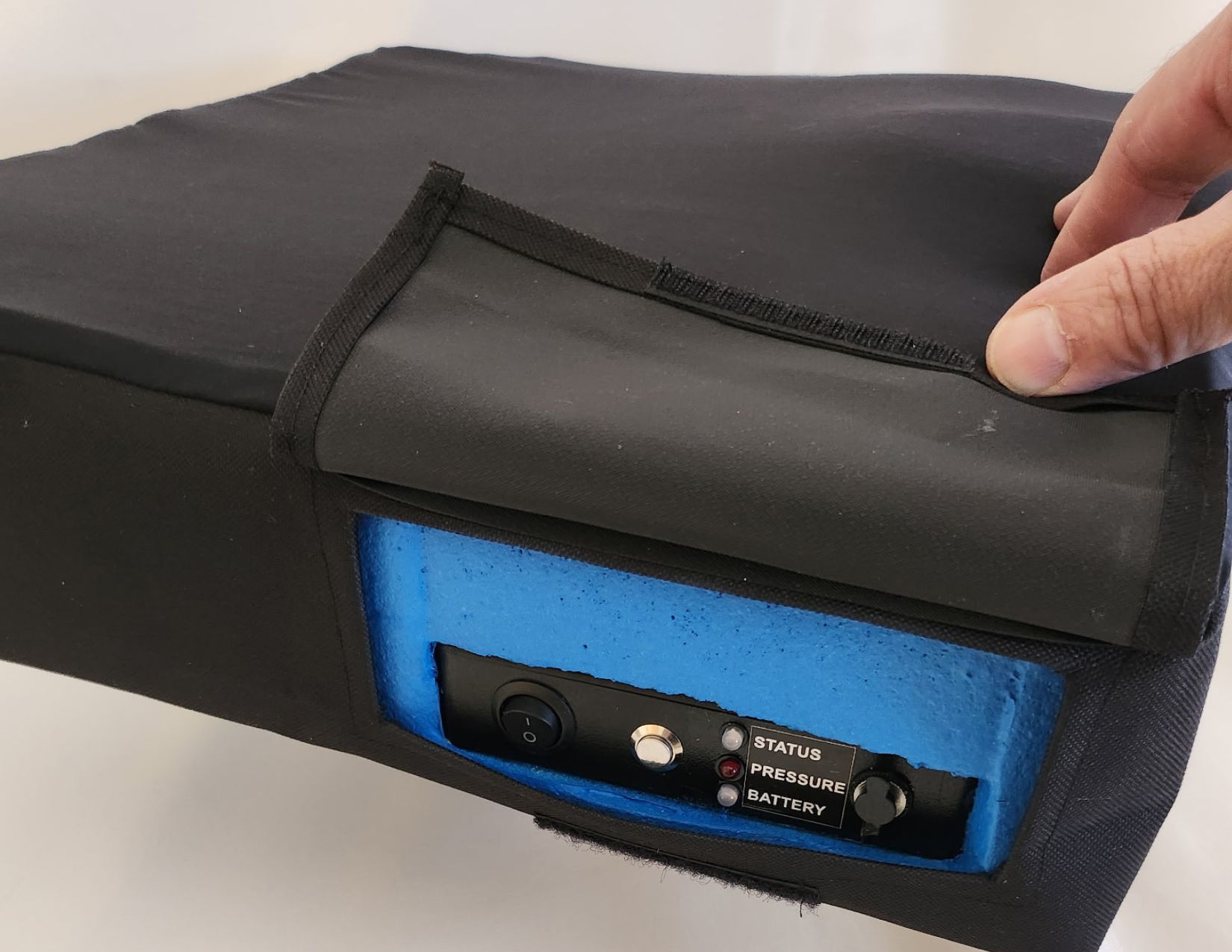 Aquila's soft wheelchair cushion and pressure controls Medical-grade contoured wheelchair cushion designed for pressure relief, customizing support settings, made by Aquila.
